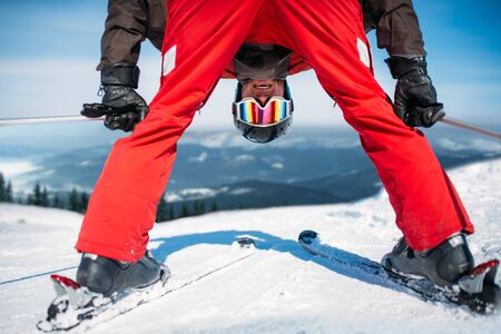 Skier in helmet and glasses, bottom viewの写真素材