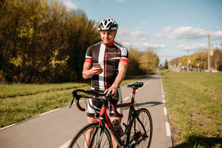 Cyclist in sportswear, training on track bikeの写真素材