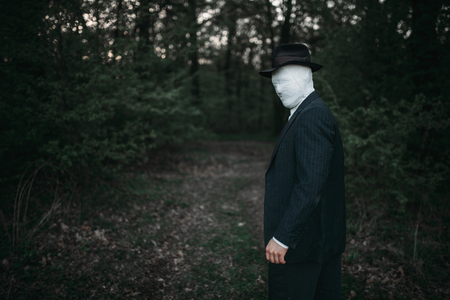 Serial maniac with face wrapped in bandagesの写真素材