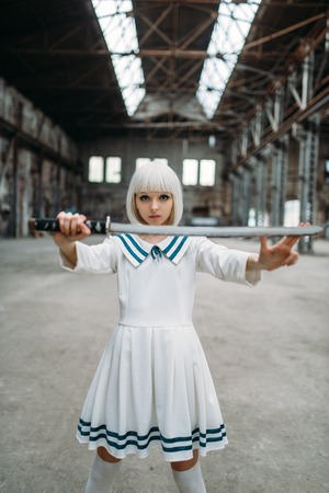 Pretty anime girl with sword, doll with blade