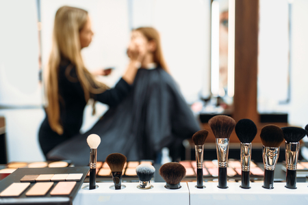 Makeup artist works with customers faceの写真素材