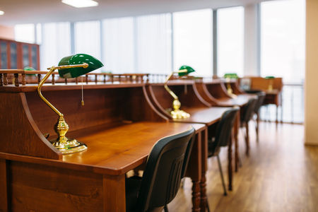 Reading room, rows of table in university library, nobody. Knowledge depository, educationの写真素材