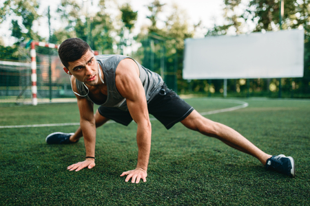Stretching exercise on outdoor fitness workoutの写真素材