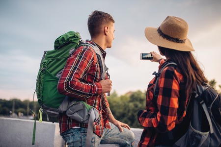 Hikers with backpacks makes selfie on excursionの写真素材