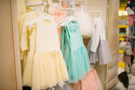 Store for newborns, showcase with dresses, nobodyの写真素材