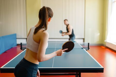 Man and woman playing  indoors