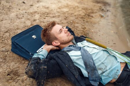 Office worker resting on the beach, desert islandの写真素材