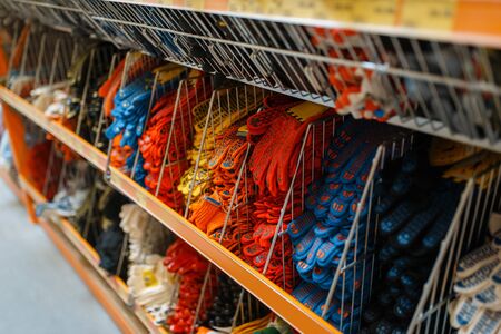 Hardware store assortment, shelf with glovesの写真素材