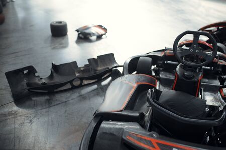 Go kart cars and damaged tires, crash, karting auto sport accident. Speed racing go-kart track. Fast vehicle competition, hot pursuitの写真素材