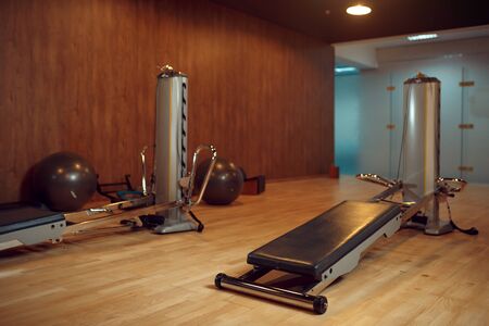 Exercise machine for pilates training in gym, nobody. Equipment for fitness workuot in empty sport club. Aerobics indoorsの写真素材