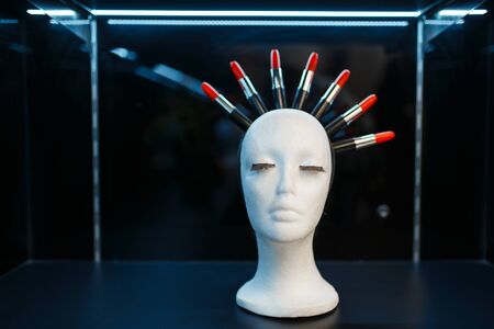 Mannequin with lipsticks set in cosmetics storeの写真素材