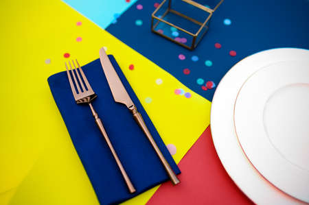 Table setting, silverware and plate closeup
