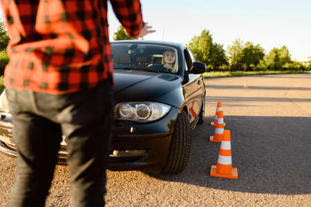 Student passes between cones, driving schoolの写真素材