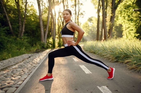 Morning training in park, stretching exercise