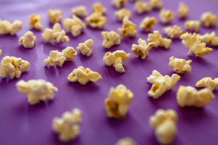 Popcorn closeup isolated on purple background