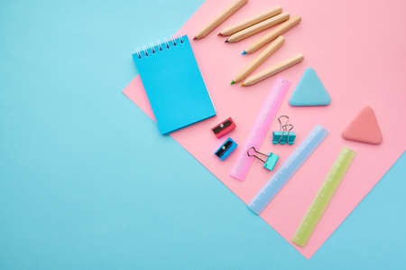 Stationery supplies, blue and pink backgroundの写真素材