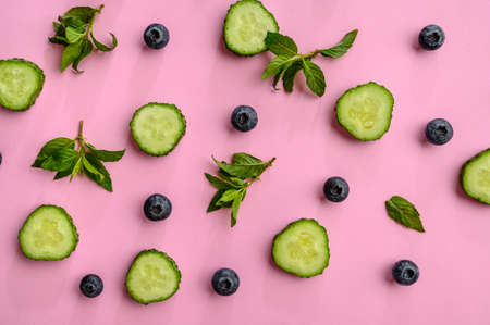 Fresh vegetables and berries on purple backgroundの写真素材