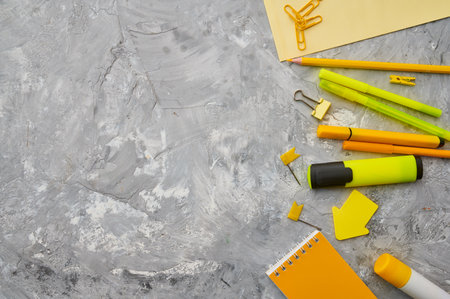 Office stationery supplies in yellow tones closeupの写真素材