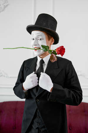 Mime artist, gentleman in love with a roseの写真素材