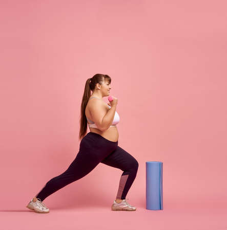 Overweight woman shows an indecent gestureの写真素材