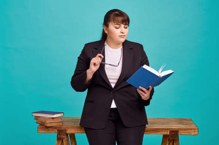 Strict overweight teacher, body positiveの写真素材