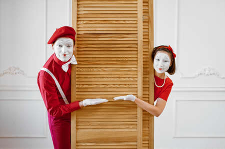 Two mime artists, scene with wooden partitionの写真素材