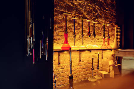 Hookahs with glass bottles, shisha bar