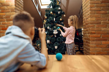 Children bloggers recording christmas blogの写真素材