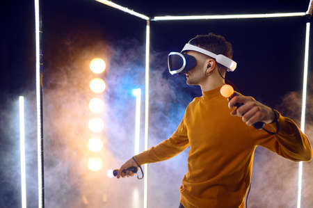 Gamer plays the game using virtual reality headset