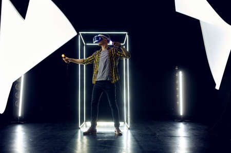 Gamer in virtual reality headset, cyber life