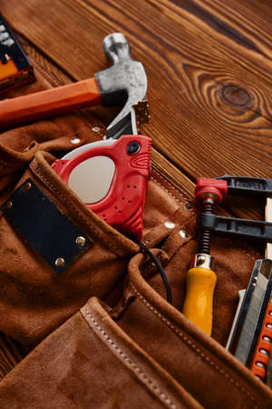 Hammer, stapler, measuring tape and hacksawの写真素材