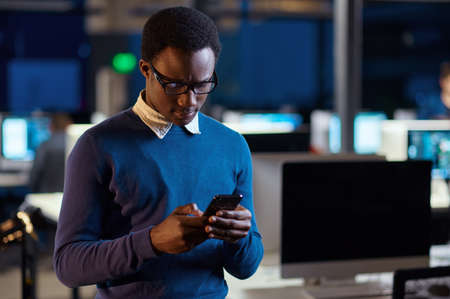 Manager with phone, office lifestyleの写真素材
