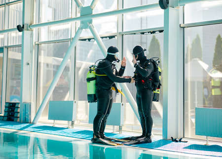 Male diver and divemaster in scuba gear, divingの写真素材