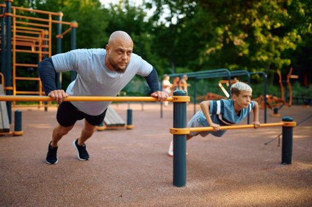 Father and child doing exercise, sport training