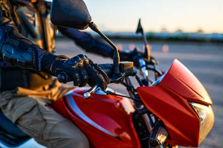 Student on motorbike, closeup, motorcycle schoolの写真素材