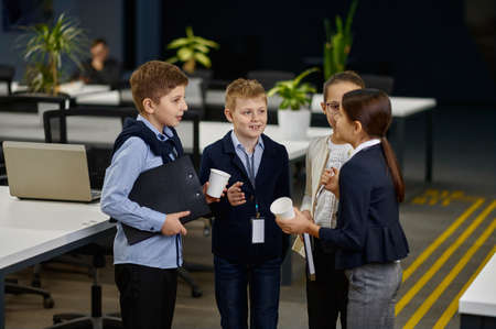Children business team discussing work in office