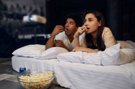 Evening film watch on projector at homeの写真素材