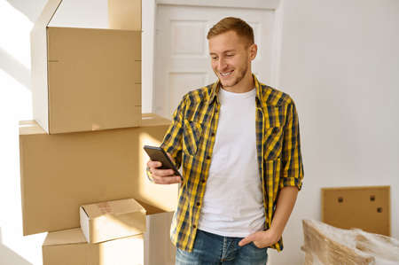 Man having video call from new home