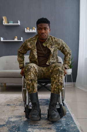 Portrait of young war veteran in wheelchair