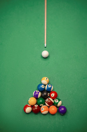 Top view on billiard ball and cueの写真素材