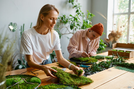Professional florists working at creative art studioの写真素材