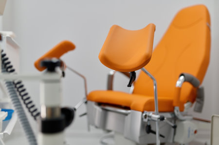 Gynecological room with chair and equipment selective focusの写真素材