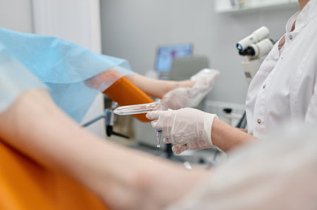 Closeup selective focus of gynecologist conduction patient examinationの写真素材