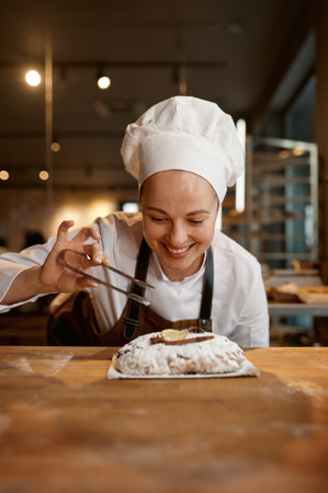 Bread bakery worker decorating diet wheat loaf or bunの写真素材