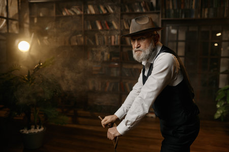 Elegant elderly business man rest at homeの写真素材