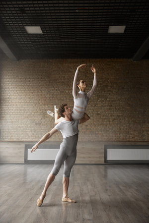 Artists graceful dance movement, ballet dancers performing beautiful actionの写真素材