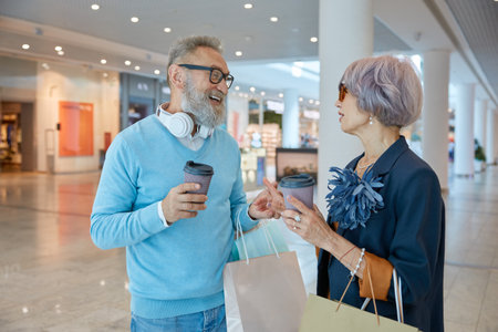 Retired people spending time in city shopping centerの写真素材