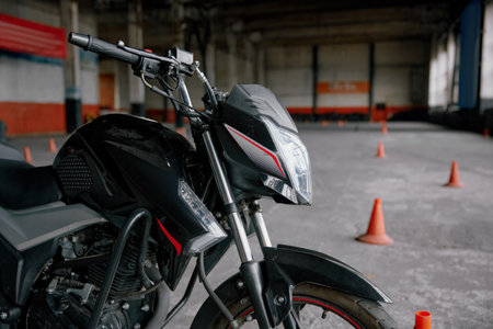 Closeup motorcycle parked at training motordrome of driving school