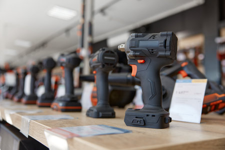 Modern professional impact drill power tool on display at hardware storeの写真素材