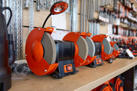 Modern sharpening wheel with grinding adhesive disc at store showcase